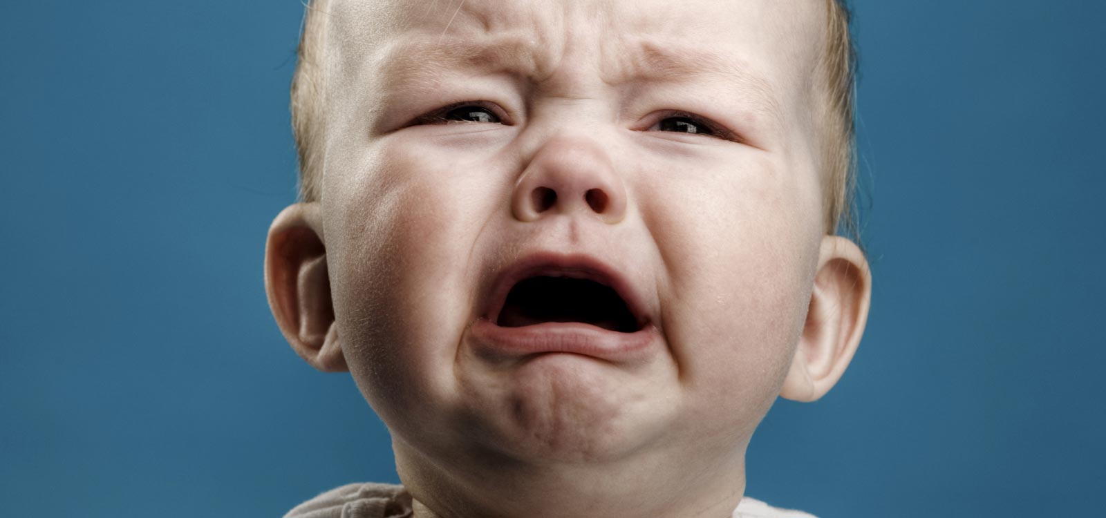 crying baby sad face